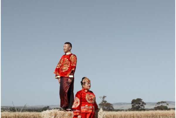 ivy and craig chinese outfits in a field. Wedding celebrations